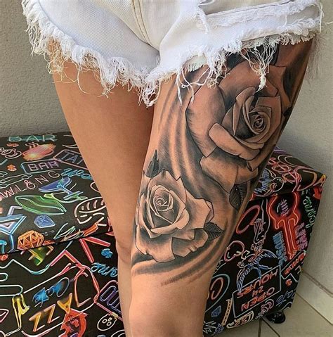 tatuagem feminina de flor na coxa|11 ideias de Tatuagens de flores na coxa 